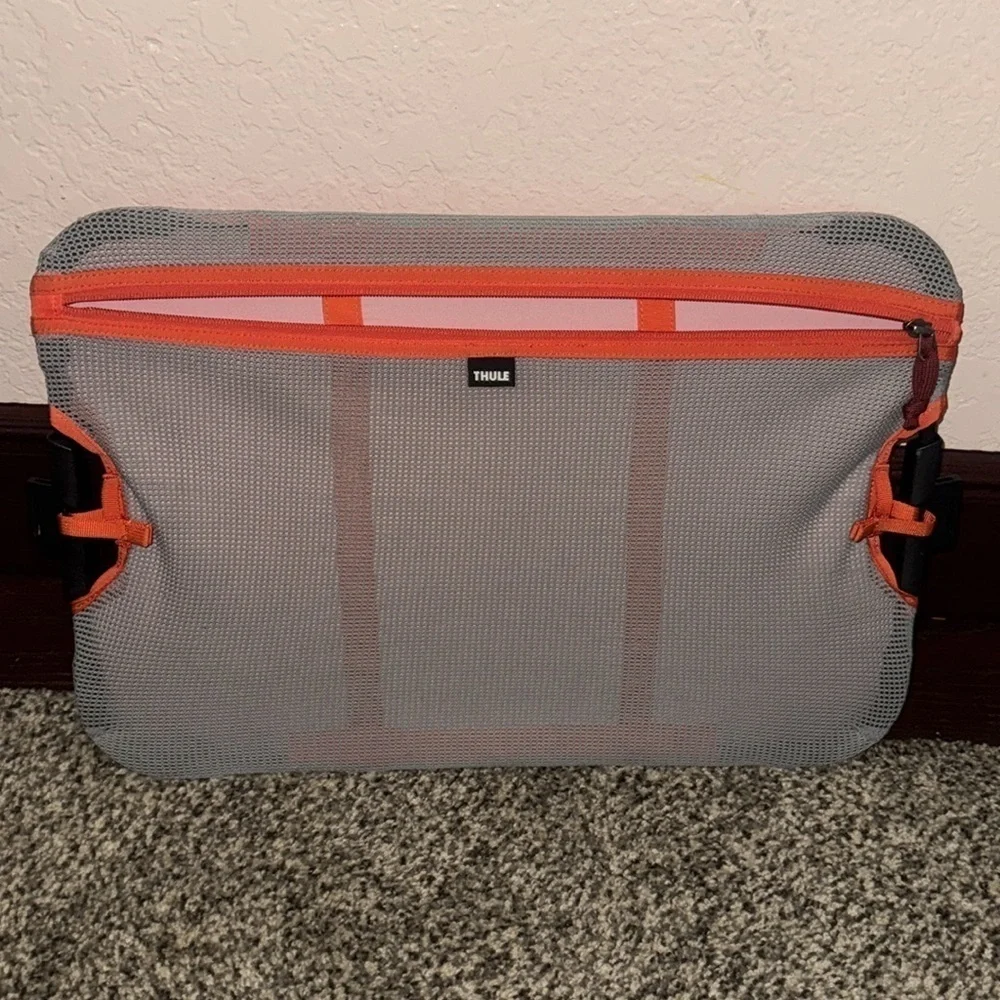 Thule Gray and Orange Pocket for Thule Suit Case. Excellent used condition